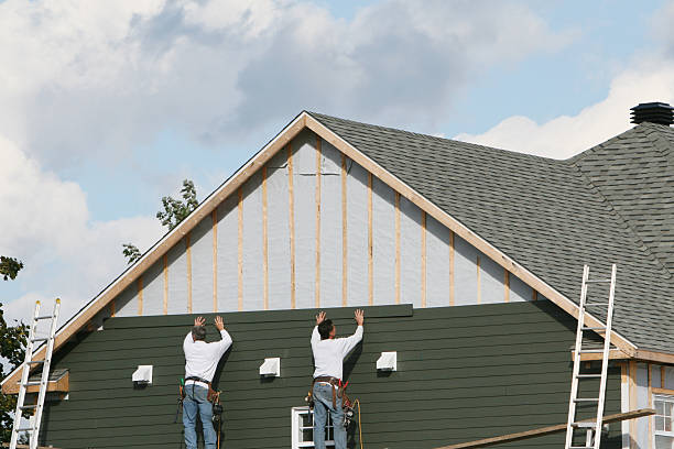 Professional Storm Damage Siding Repair technician working in Danbury, CT